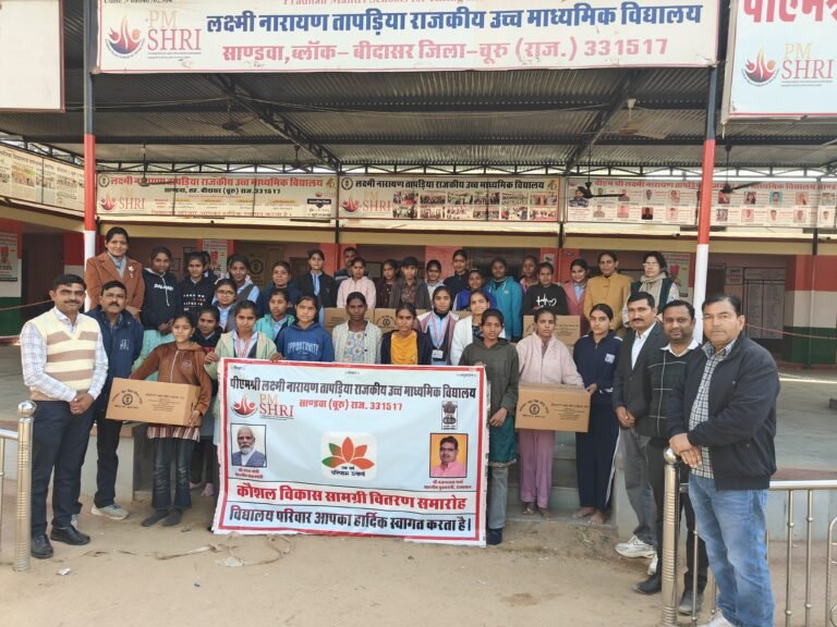 School event group photo at campus entrance